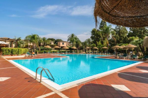 Apartments in residence with swimming pool in Santa Margherita di Pula, 250 meters from the sea Pula